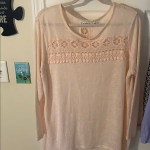 Long sleeve light pink or creme looking top